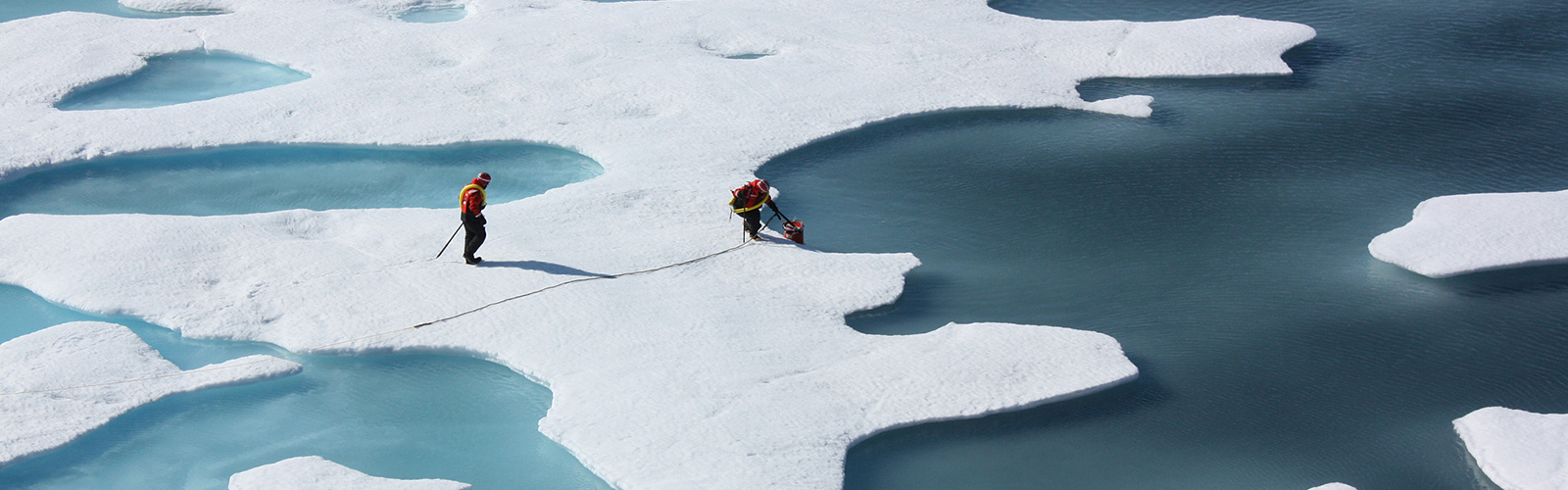Scientists on Arctic sea ice and melt ponds in the Chukchi Sea during NASA's ICESCAPE mission